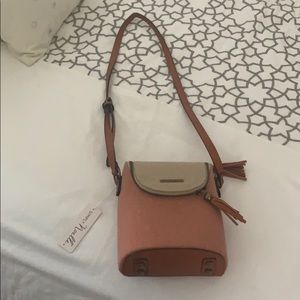 Never used cross body bag with tags on!